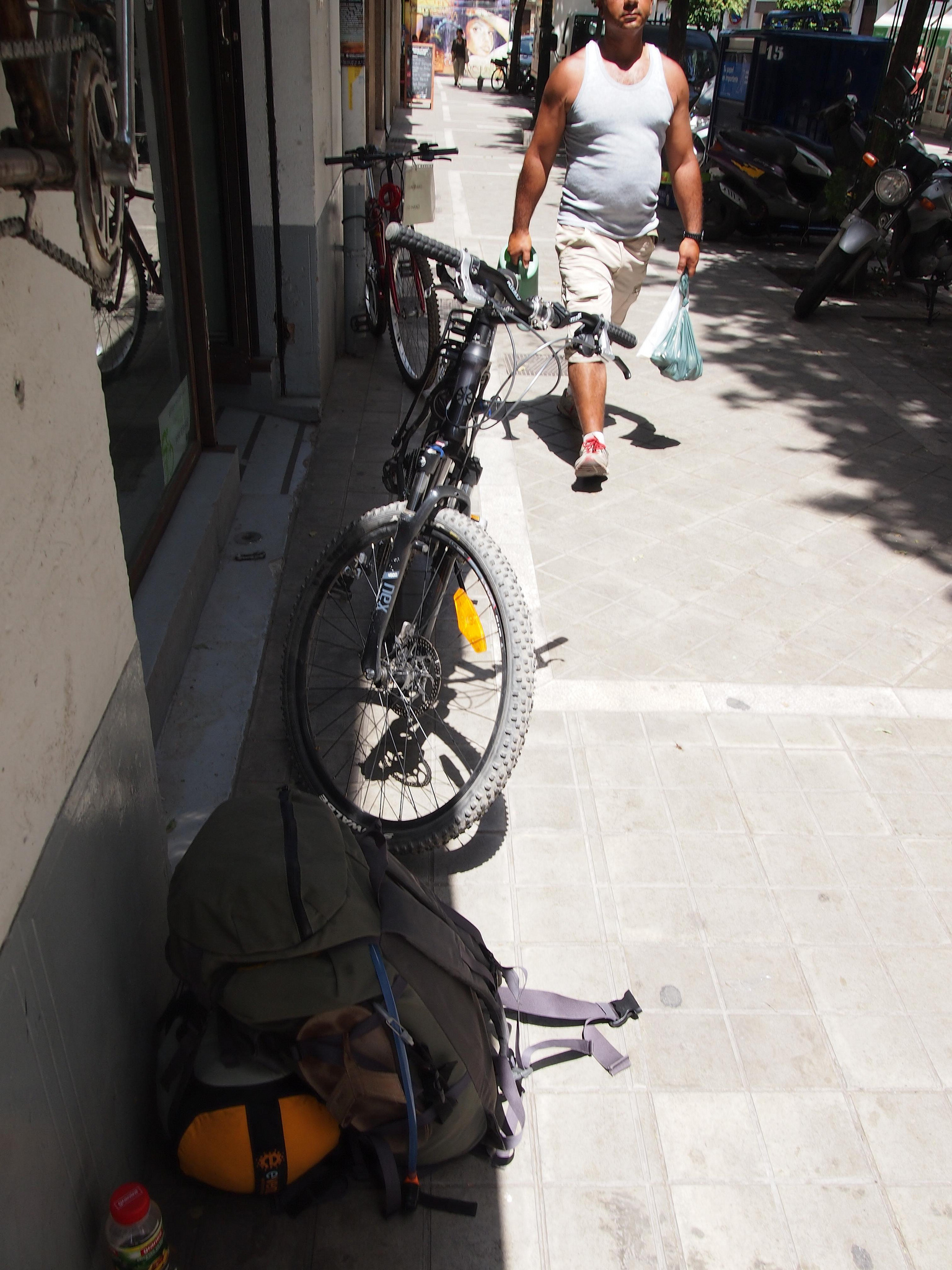 bicycle leaning beside a building