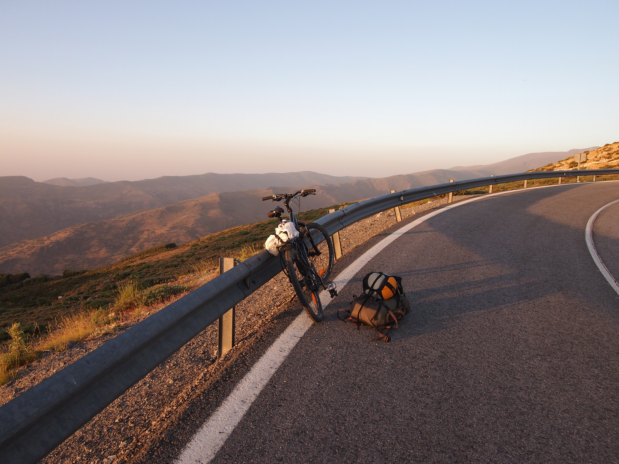 bicycle on the side of the road further up a hill