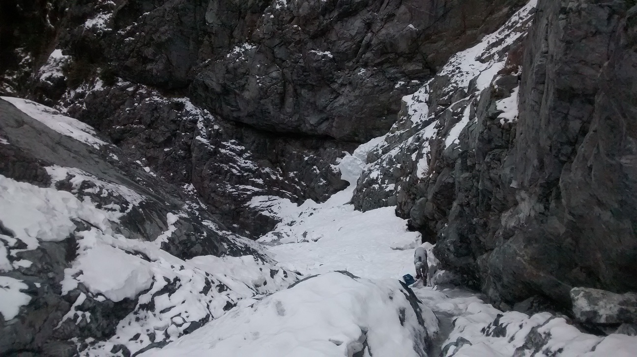 Mike putting on crampons