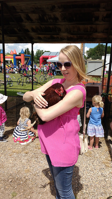 Dorothy holding a rooster